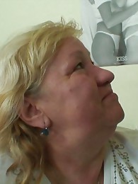 The chubby mature whore is in his bed and she wants to take his cock in her old hole